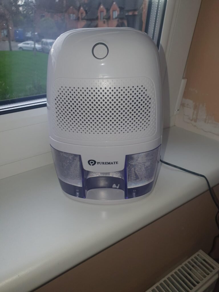 view of our own new purchase testing puremate small compact dehumidifier uk unboxing package arrival several weeks to months